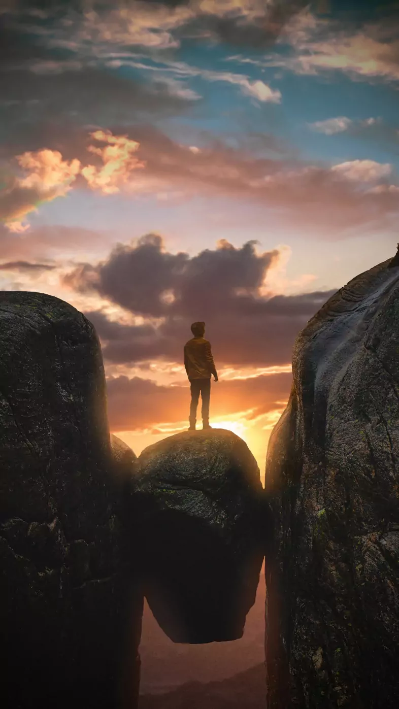 boy standing mountains wallpaper
