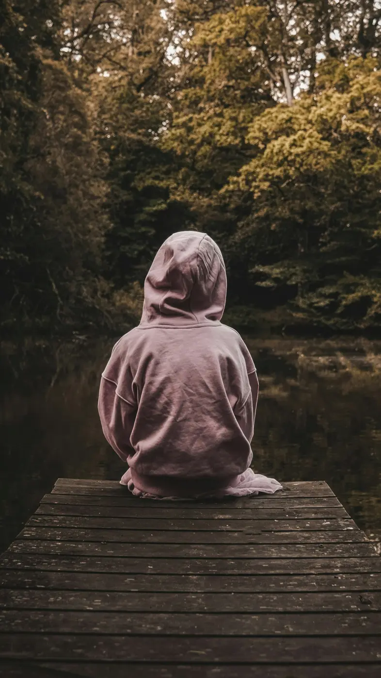 child sitting pier alone wallpaper