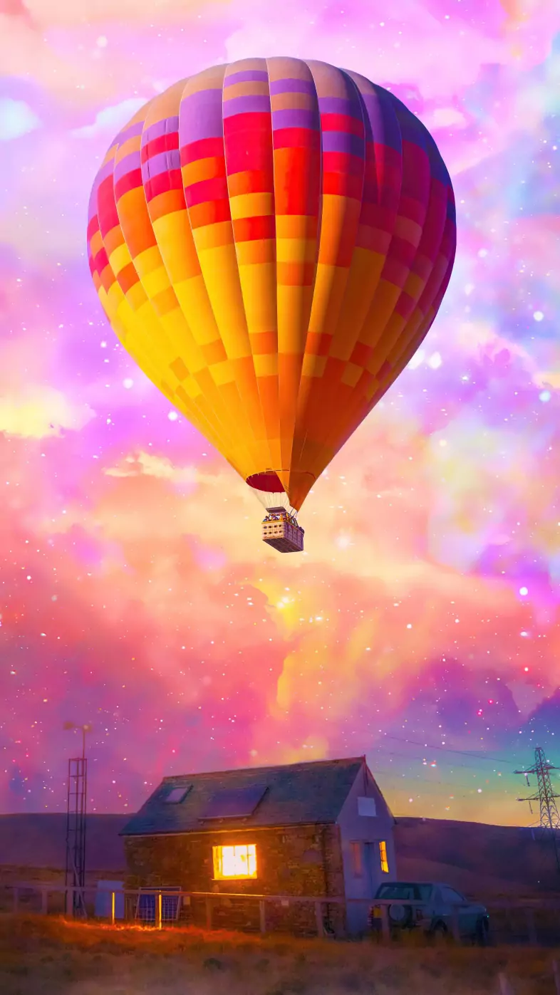 hot air balloon flying over house wallpaper