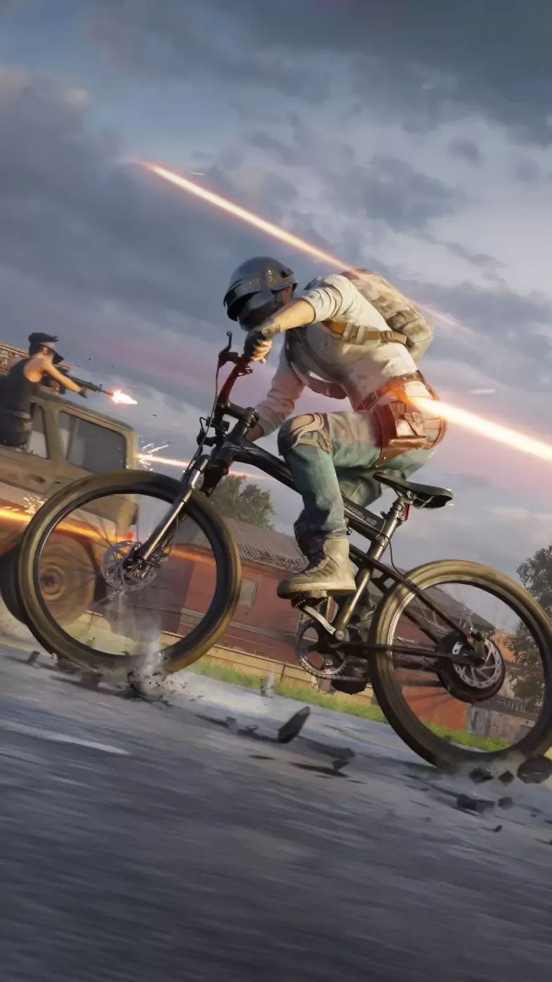 pubg helmet guy on bicycle game wallpaper